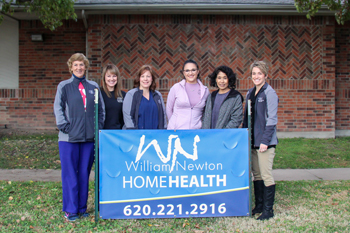 Several William Newton Home Health staff members gather to commemorate the first full day at the agency’s new downtown location. From left: Chris Rogers, BSN, RN, Stacy Wells, BSN, RN, Amber White, RN, Rachel Torrez, RN, Veronica Ray, Administrative Assistant & Certified Professional Coder, Rachel Livingston, BSN, RN, William Newton Home Health director.